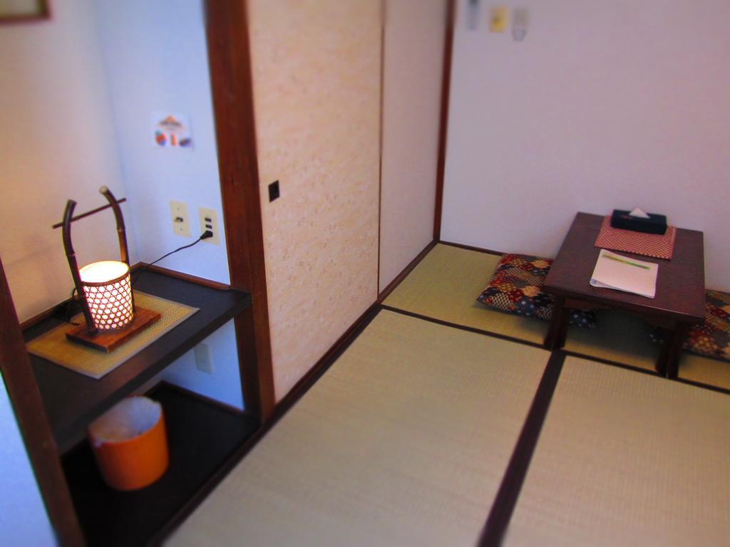 J-Hoppers Hiroshima Pensión Habitación foto